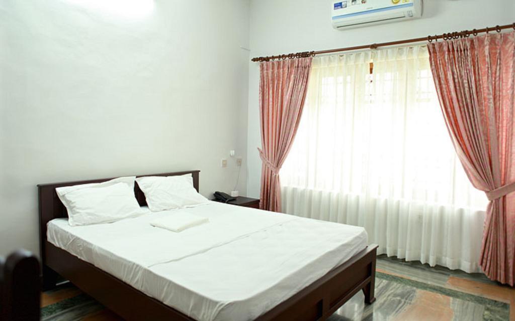 The Health Village Alwaye Room photo